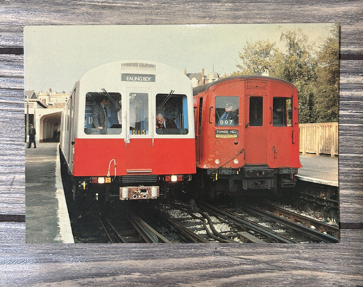 Vintage Old and new District Line stock at Ealing Broadway Post Card 