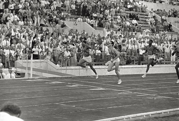 Italian athlete Livio Berruti crossin finishing line of 200 metre - Old Photo