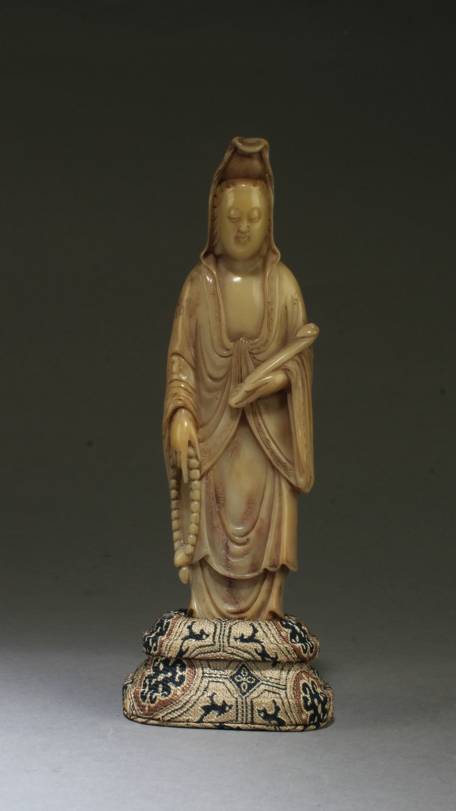 Chinese Soapstone Guanyin Statue. Comes fitted with a stand.