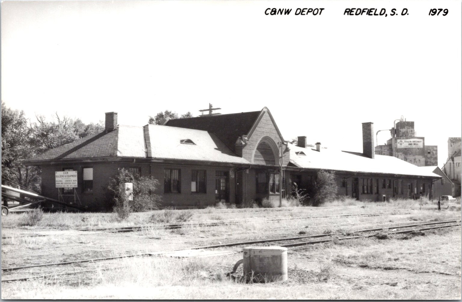 C&NW Railroad Train Station Depot Redfield, SD South Dakota Postcard RR Tracks