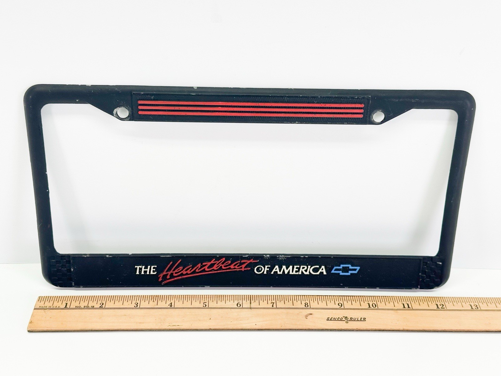 Vintage 1980's Chevrolet THE HEARTBEAT OF AMERICA Metal License Plate Frame VHTF