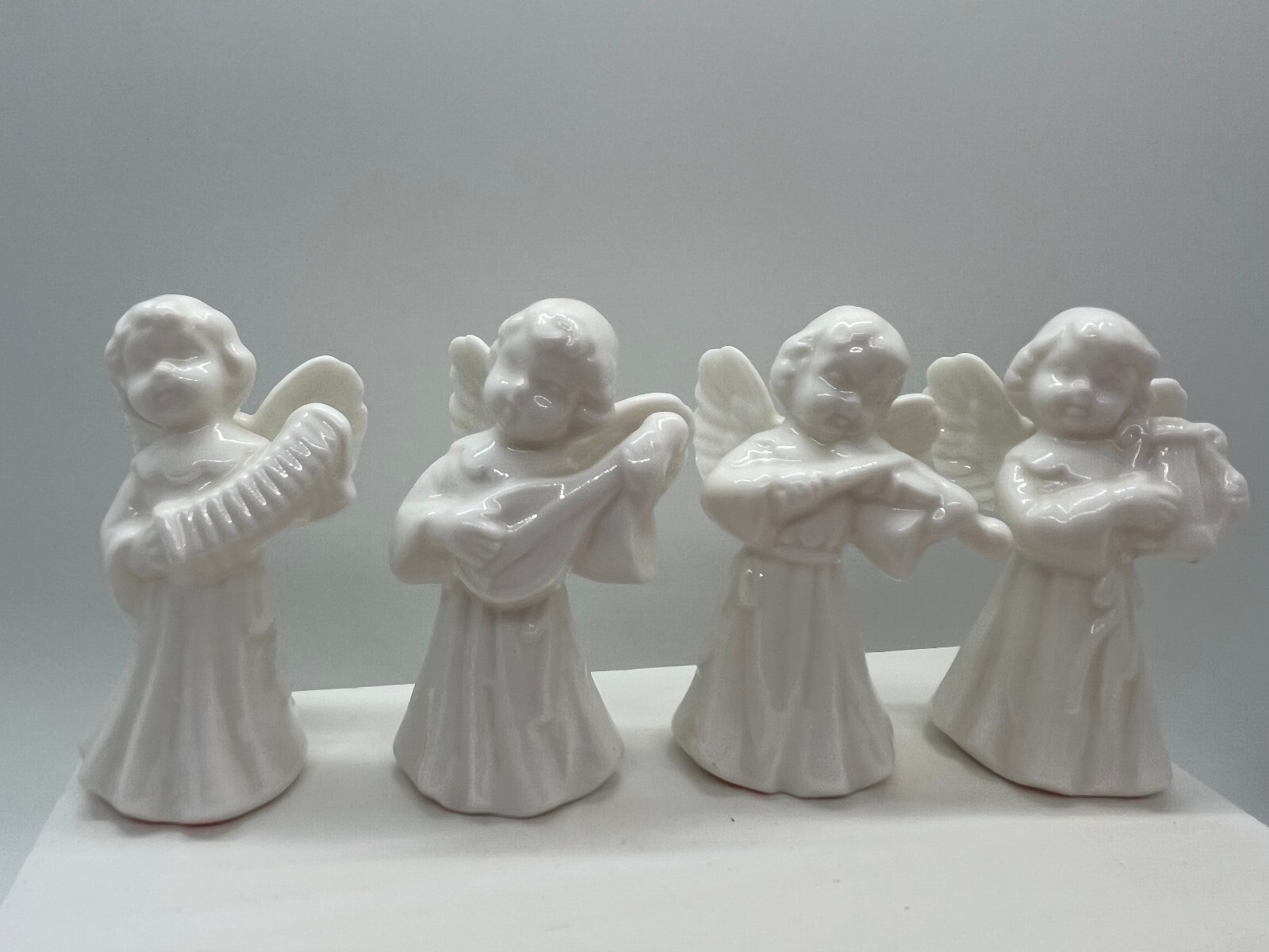 Gorham Porcelain Angels. Set of 8.