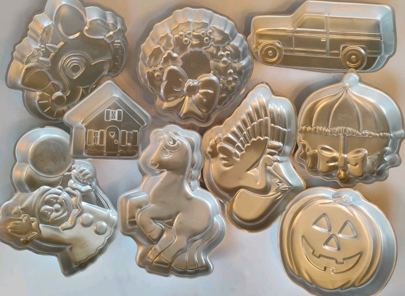 Lot Of 9 - Vtg Wilton Cake Pans 80’s Rudolph, Pumpkin, Stork, Truck, House, Pony Lot Of 9 - Vtg Wilton Cake Pans 80’s Rudolph, Pumpkin, Stork, Truck, House, Pony