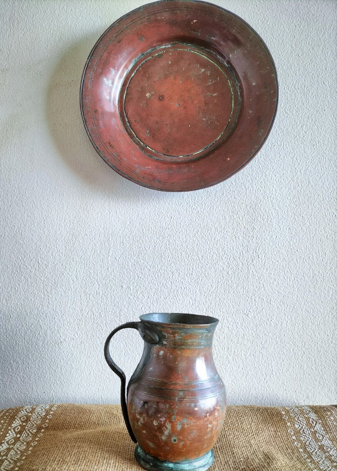 Rustic vintage copper plate and small jug