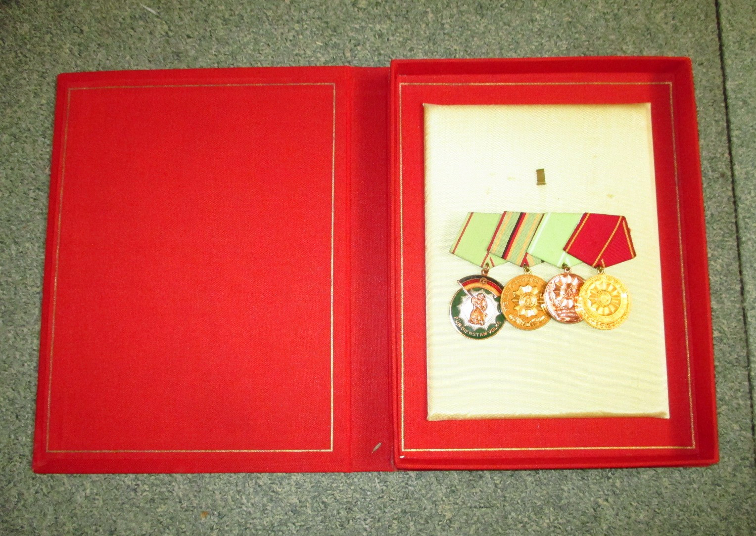 East German DDR Four Rare VioPo Original medals mounted and cased