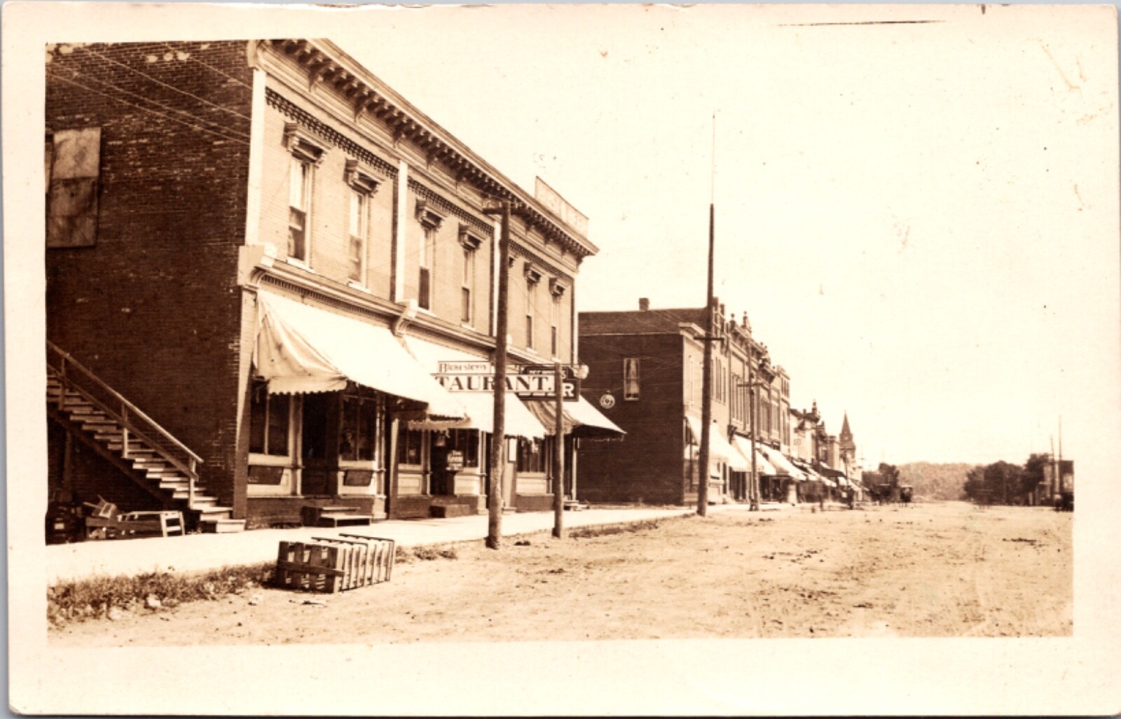 Real Photo Postcard Dirt Business Street, Restaurant in Coon Rapids, Iowa
