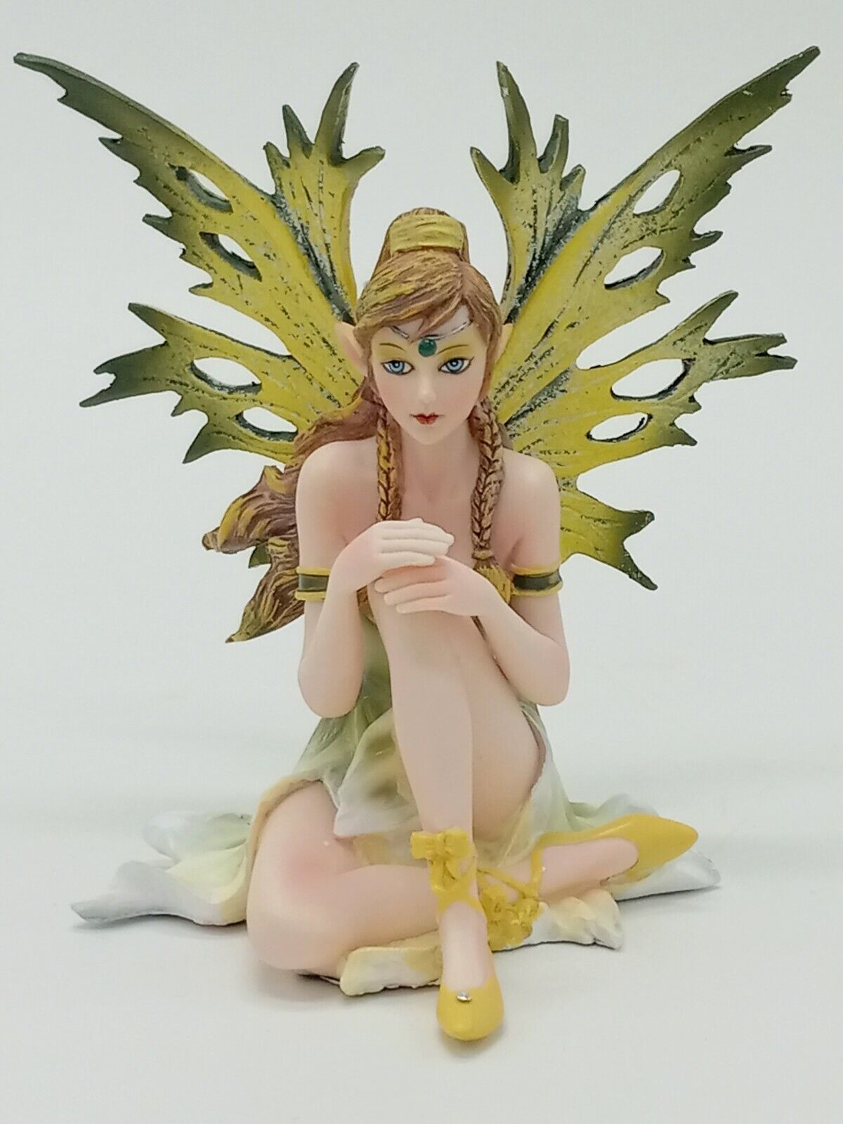 Sitting Green and Yellow Fairy with Ponytail and Braids Collectible Figurine