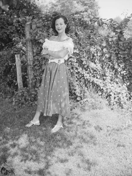 Austrian-born American actress Hedy Lamarr wears a gypsy sort of o- Old Photo