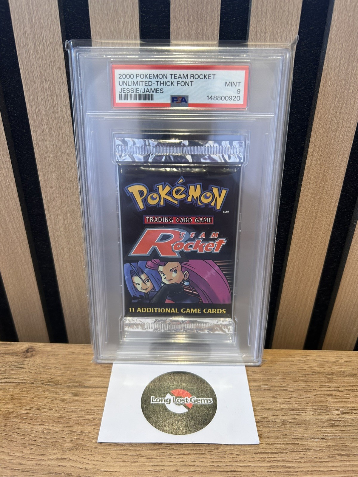 PSA 9 Team Rocket Booster Pack 2000 Jessie/James Artwork - MINT Thick Font