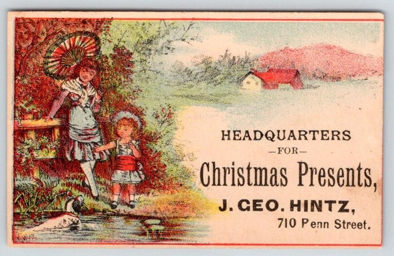 1880-90\'s J GEO HINTZ HEADQUARTERS for CHRISTMAS PRESENTS VICTORIAN TRADE CARD