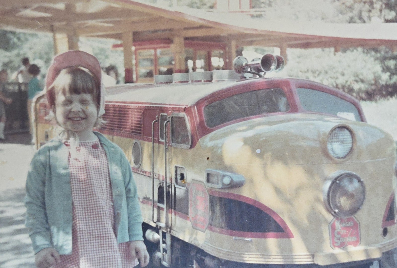 Vintage Photo Snapshot of Young Girl Smiling by Small Kansas City Southern Train