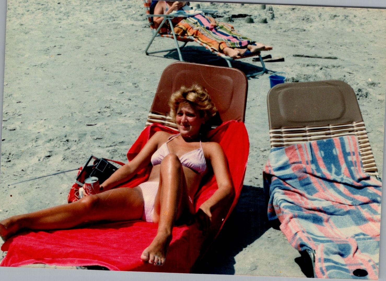 1970s Beach Photograph of Young Woman in String Bikini & Coca-Cola by Chair 1970s Beach Photograph of Young Woman in String Bikini & Coca-Cola by Chair