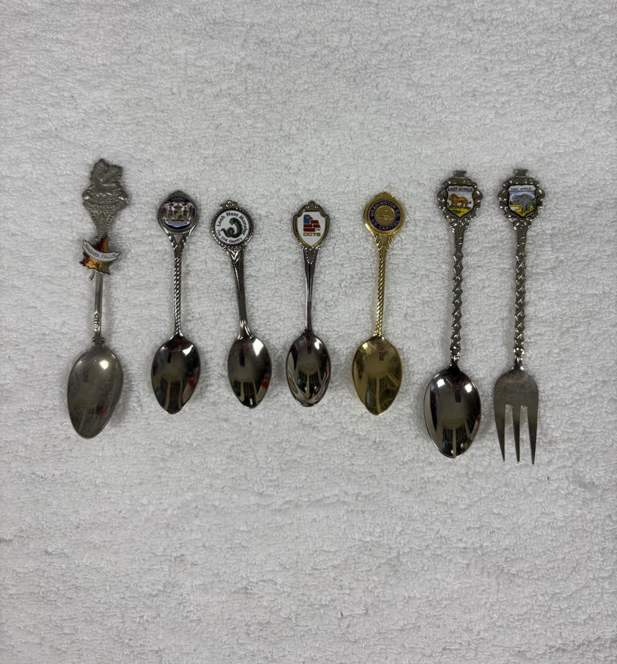Souvenir Collectible Spoons Lot 7 Canada Africa Loch Ness Hawaii Washington D.C.