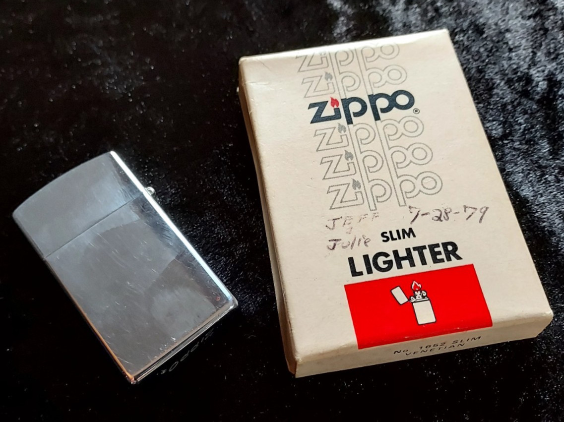 Vintage 1970’s Zippo Slim Chrome Lighter with box. Pre-owned.