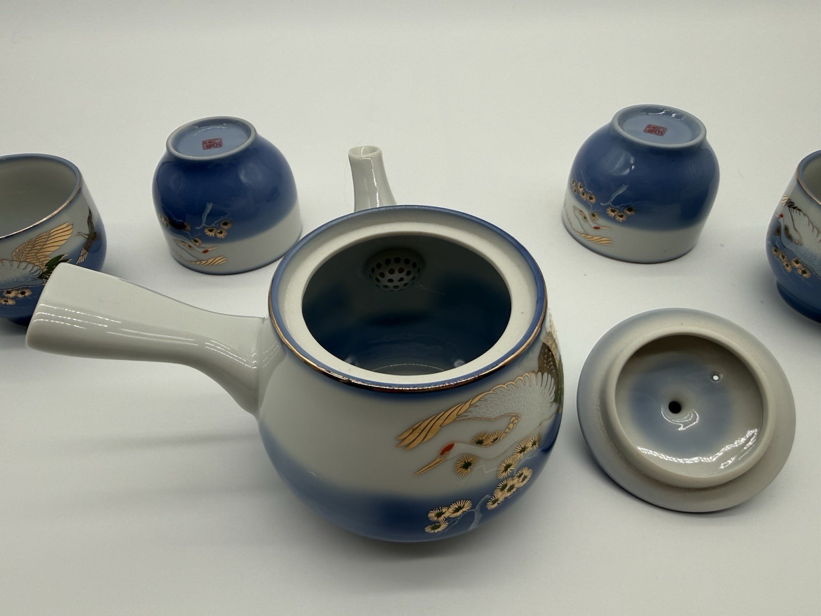 vintage Mid 20th CenturyJapanese porcelain blue ombre crane design tea set. vintage Mid 20th CenturyJapanese porcelain blue ombre crane design tea set.