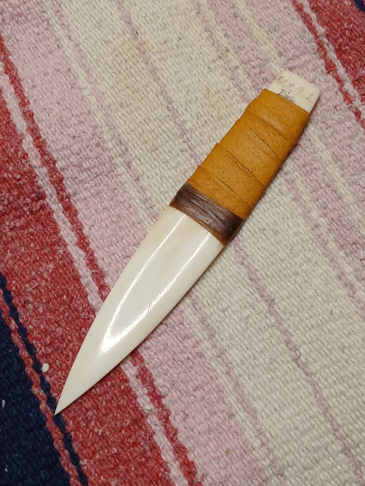 handcrafted primitive-style fixed-blade knife polished Buffalo bone blade Leathe