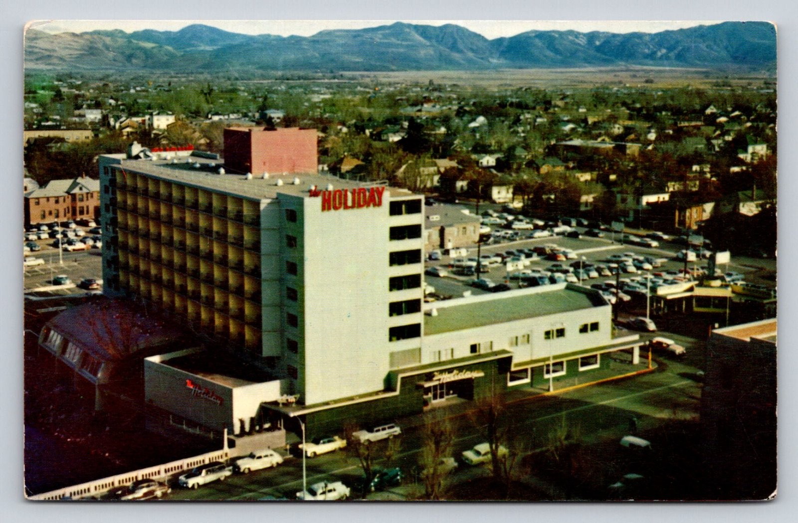 Reno Nevada Holiday Hotel Mountains Aerial View Mike Roberts Postcard N016