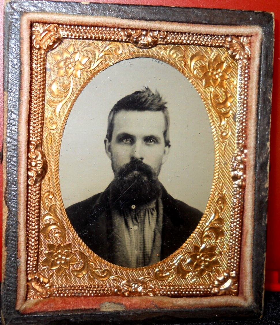 1/9th Size Tintype of young man in half case