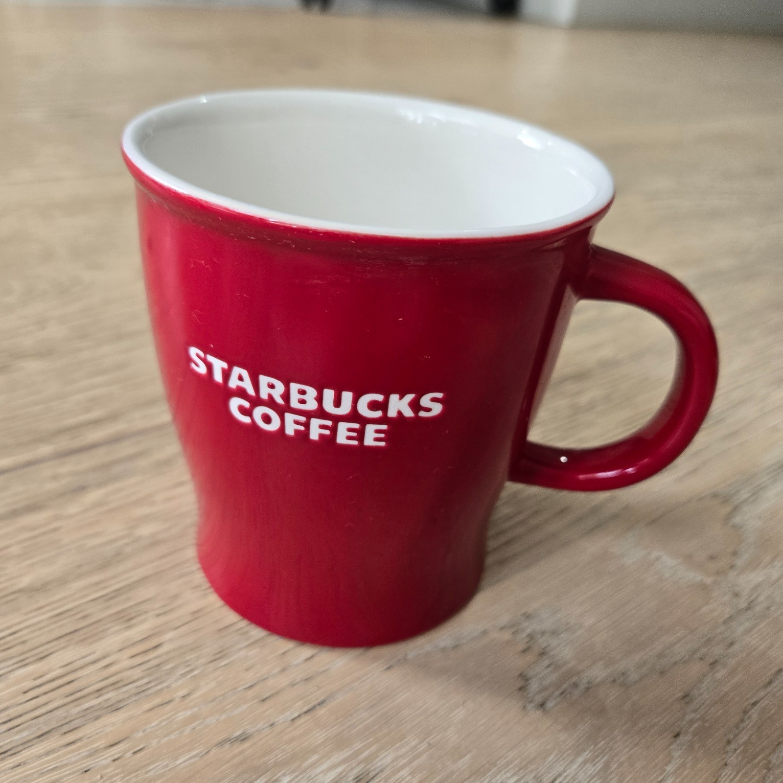 2009 Starbucks New Bone China Coffee Mug Red w/ White Embossed Lettering Logo 2009 Starbucks New Bone China Coffee Mug Red w/ White Embossed Lettering Logo