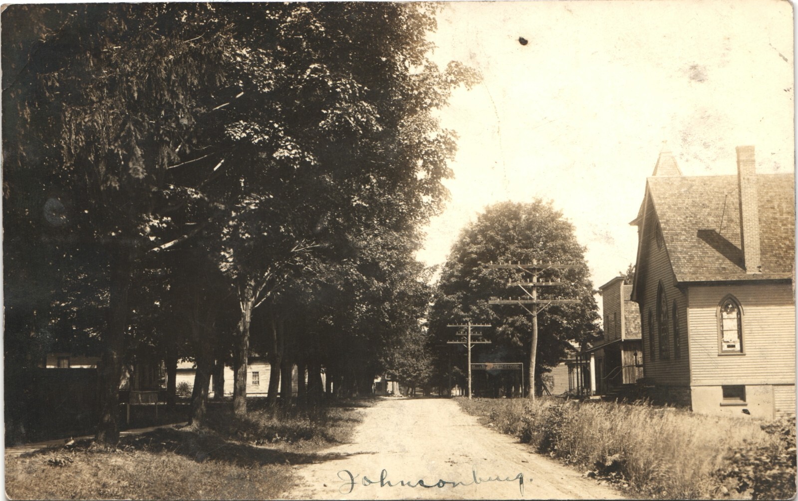 MAIN STREET VIEW original real photo postcard rppc JOHNSONBURG NEW YORK NY c1910