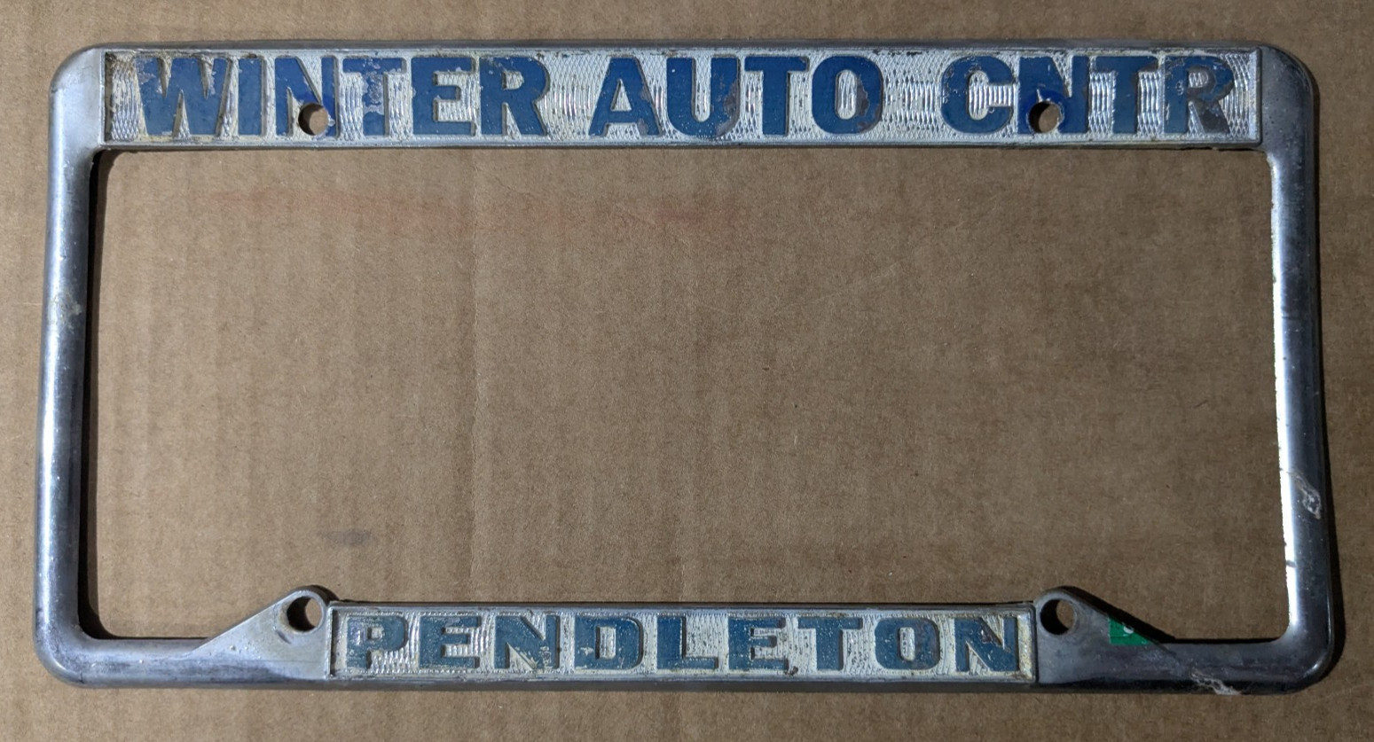 VTG Metal Winter Auto CNTR Pendleton OR Embossed Dealership License Plate Frame