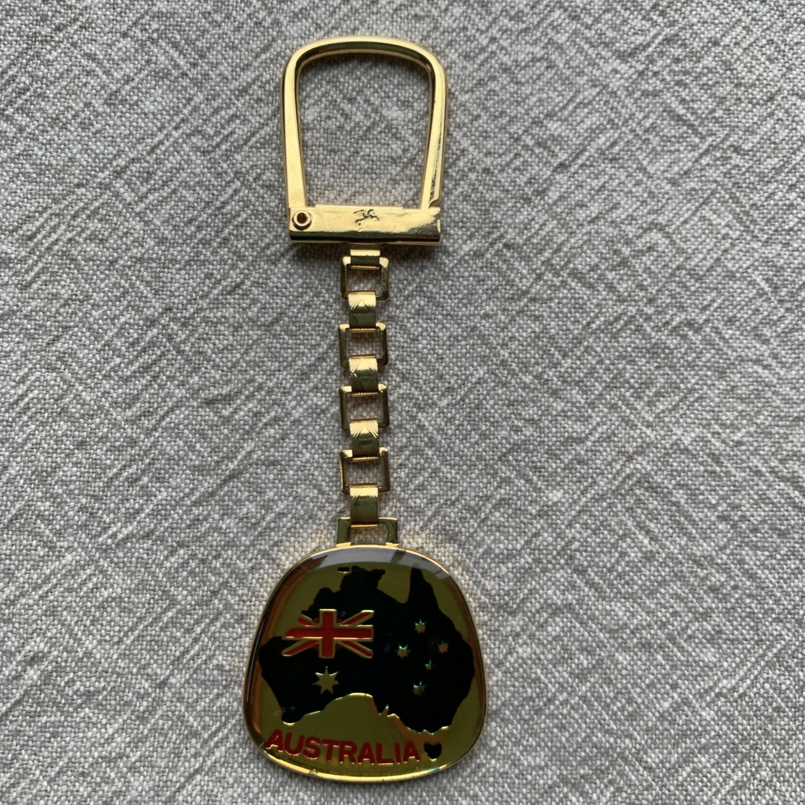 Vintage Australia Pegasus enameled keychain with gold tone finish