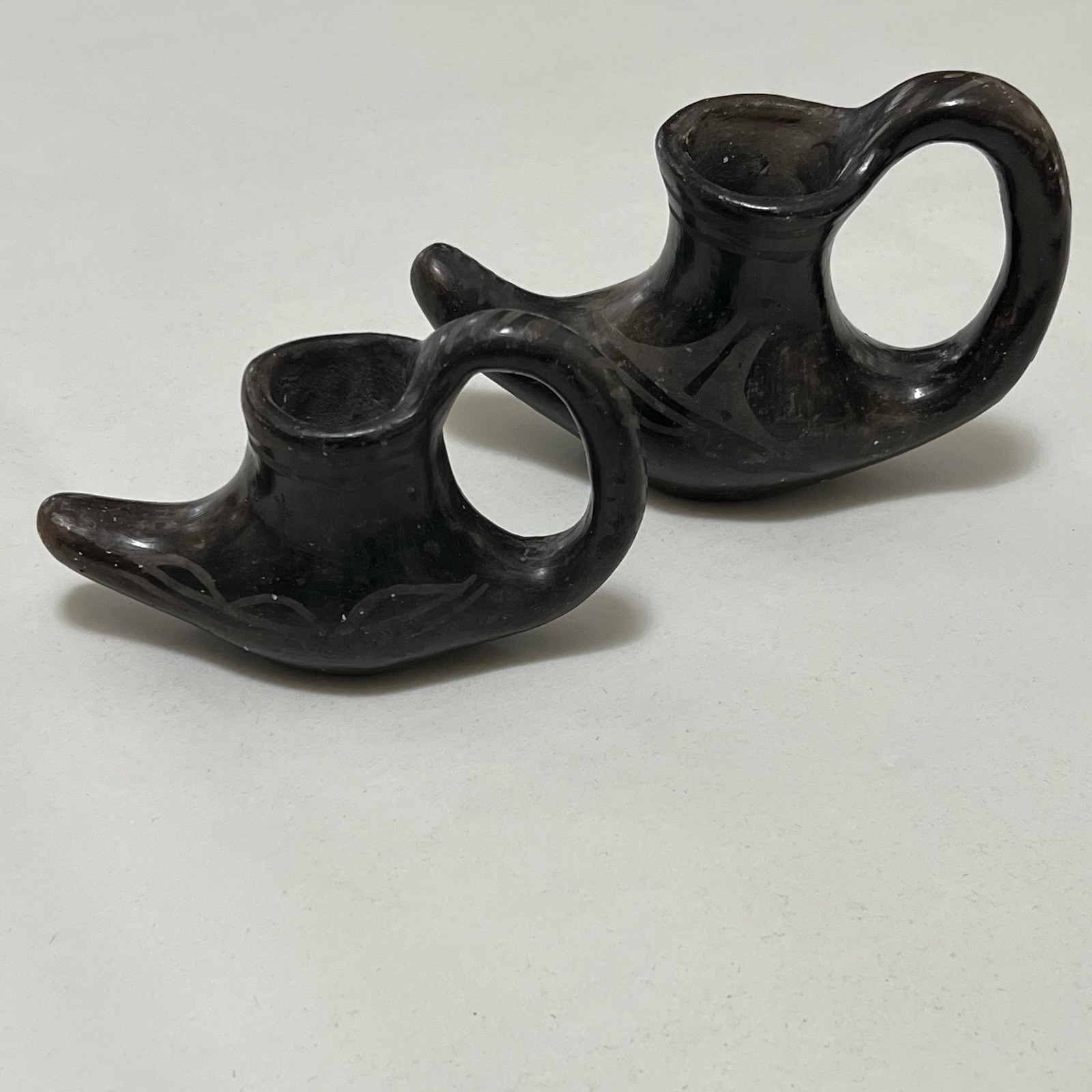Santo Domingo Pottery Moccasin Candle Holders Black on black San Ildefonso ?