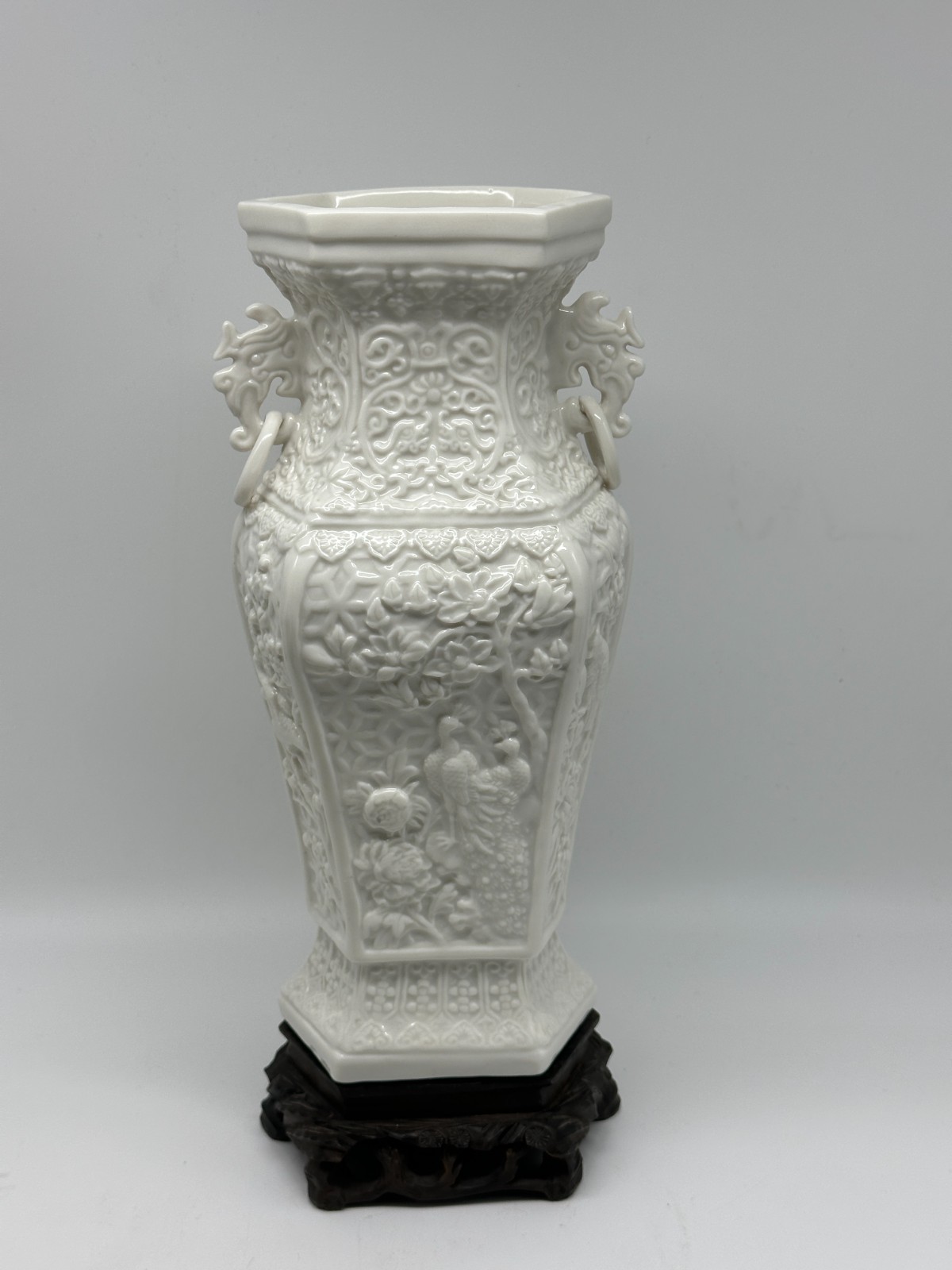 Chinese Blanc d\'chine White Porcelain Vase. Circa 1920. Carved and Fitted Stand