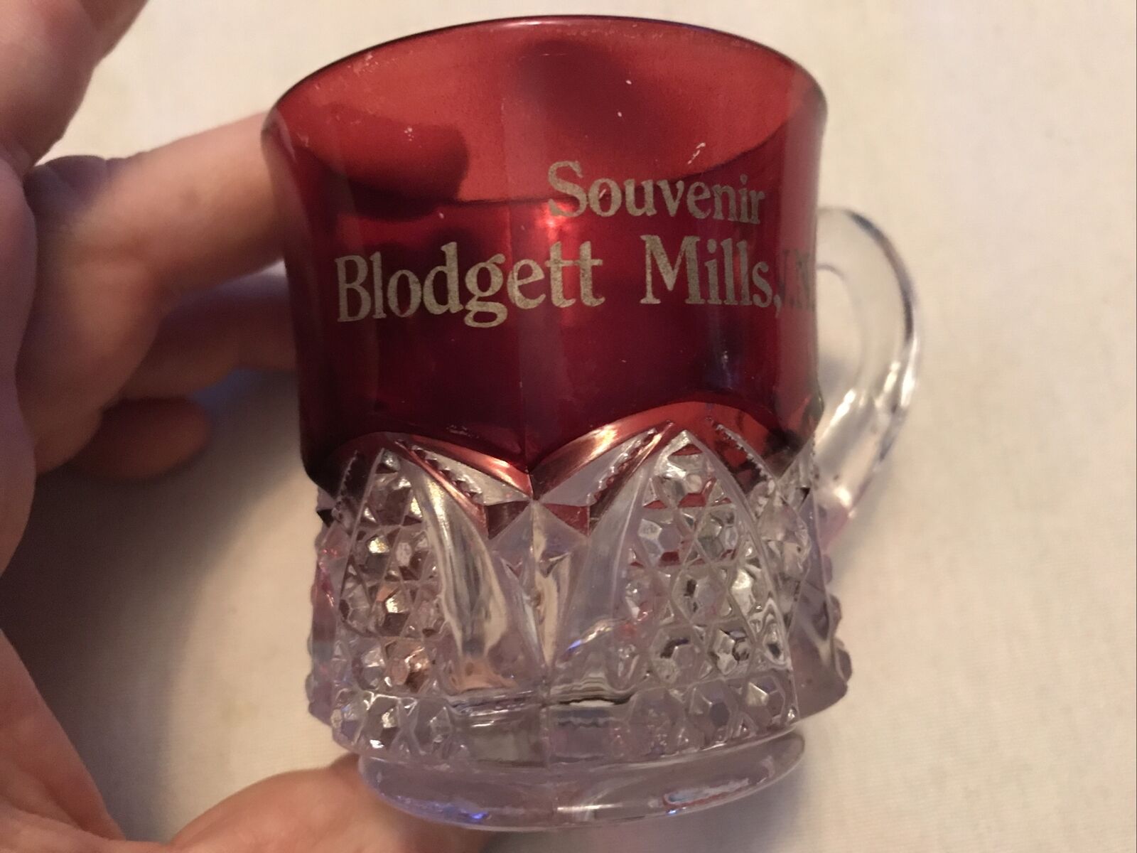 BLODGETT MILLS, NEW YORK VINTAGE RUBY GLASS SOUVENIR CUP, CIRCA 1900