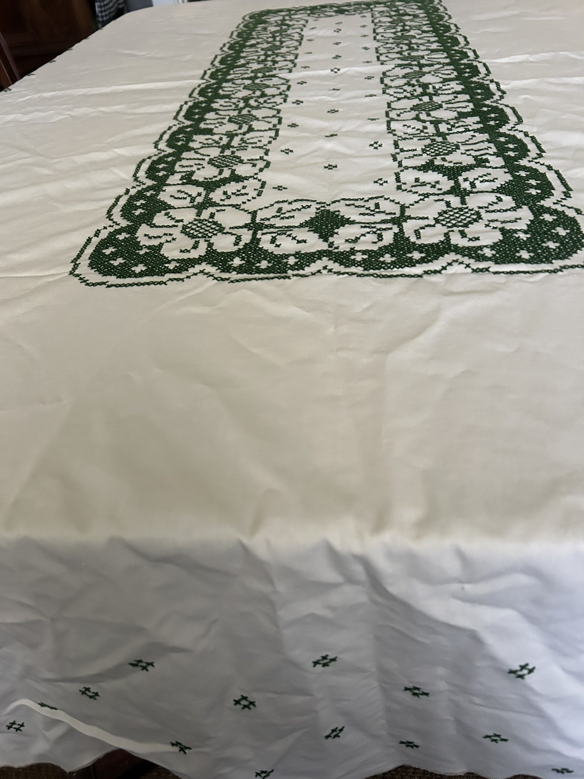 Vtg Cream Tablecloth W/green Cross-stitch Floral Design Center & Sides. 86”x58”. Vtg Cream Tablecloth W/green Cross-stitch Floral Design Center & Sides. 86”x58”.