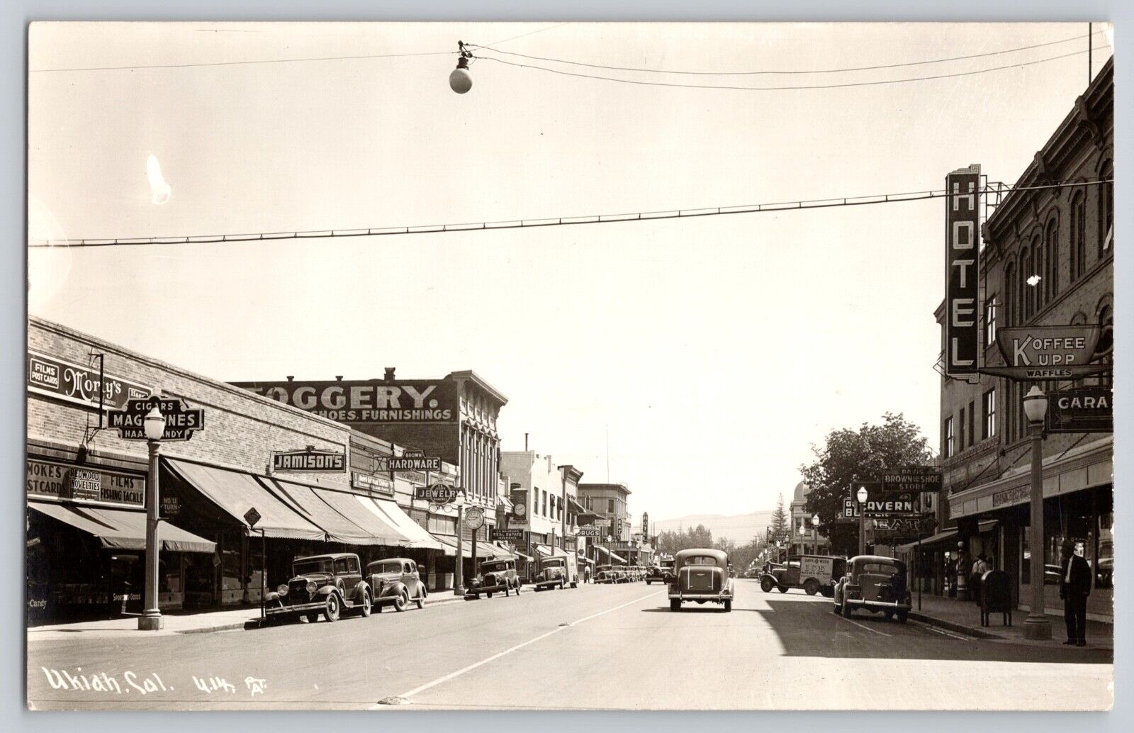 Postcard RPPC California Ukiah Street Scene Vintage Cars Signs Shops Drugstore