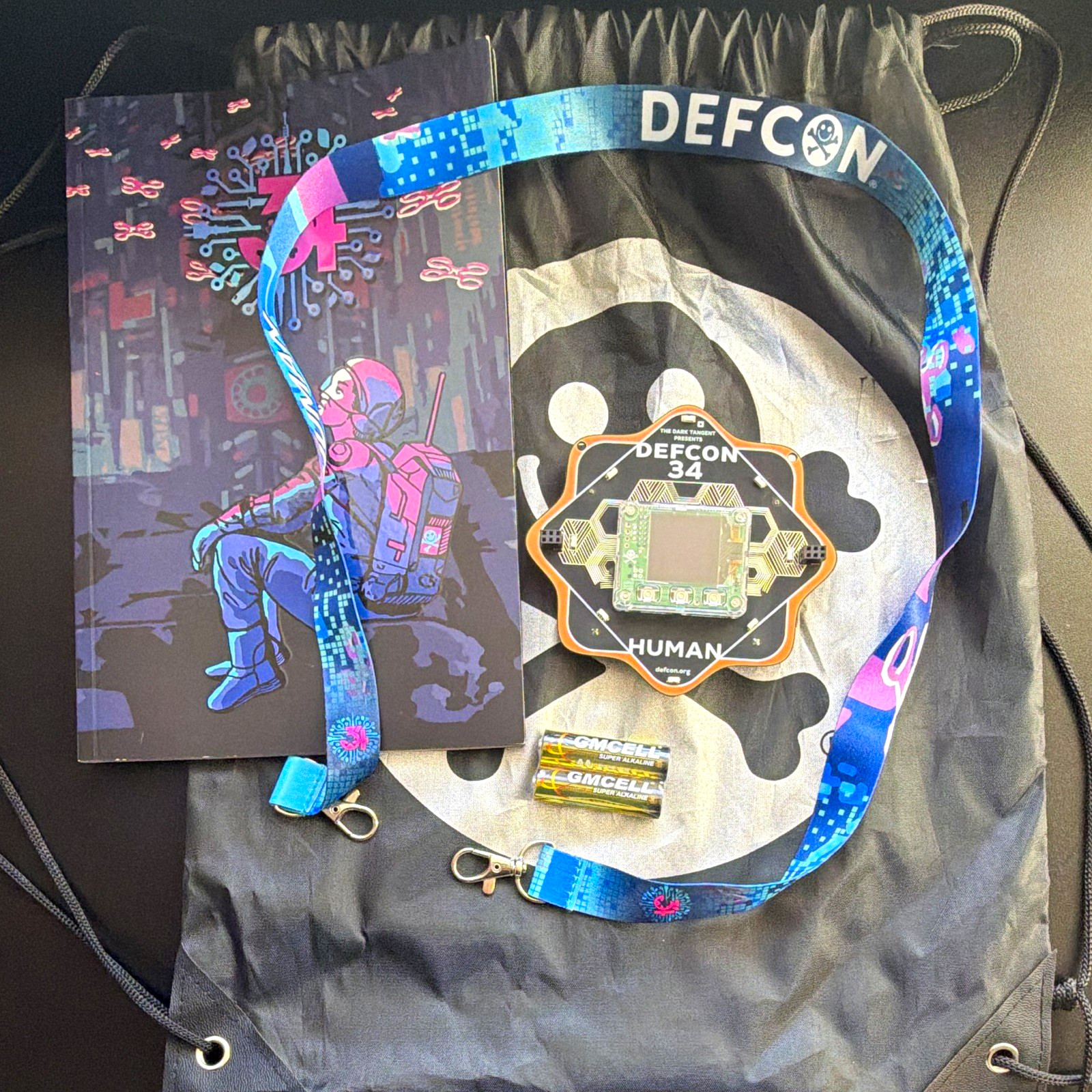 DEFCON 34 Human Electronic Badge & Lanyard, Drawstring Bag, Programme/Booklet