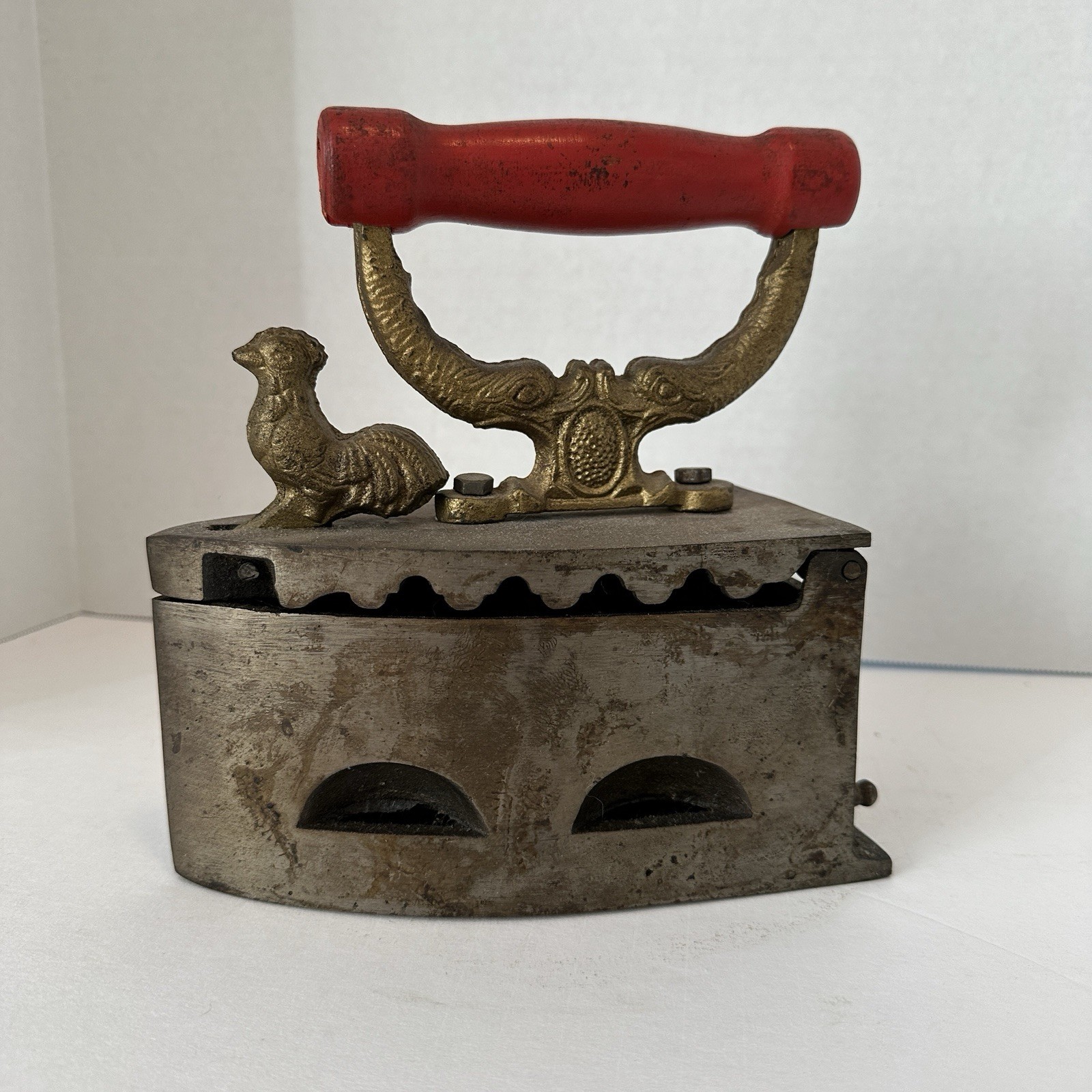 Antique Cast Iron Charcoal Sad Iron Red Handle and Rooster Latch from Ghana 1972