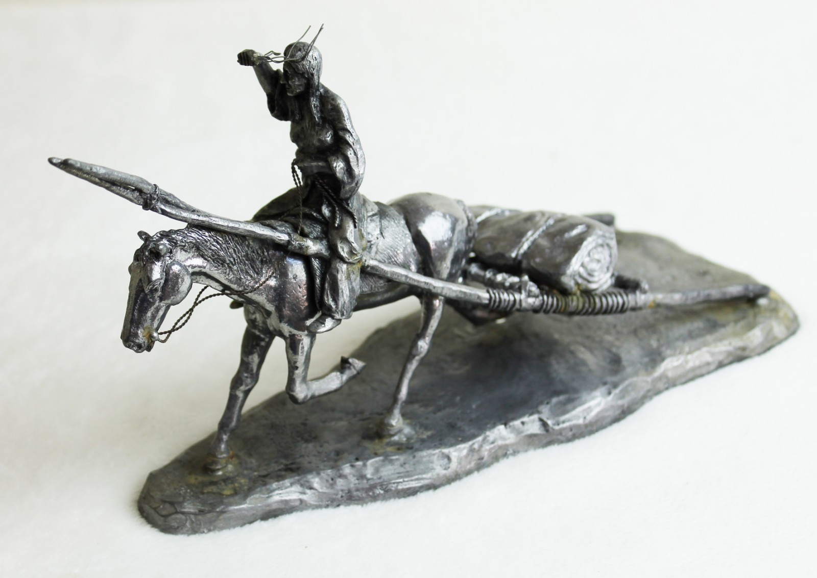 Michael A. Ricker Pewter Statue Native American with Horse and Travois 1976