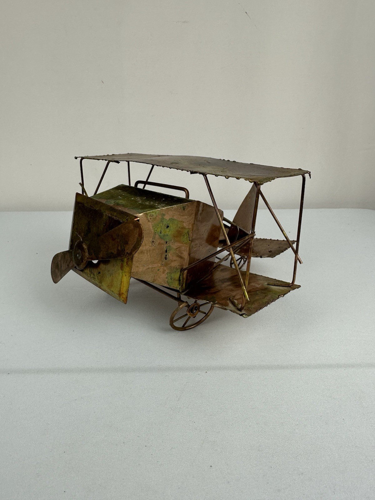 Vintage Weathered Tin Metal Biplane With Wind Up Music Box Vintage Weathered Tin Metal Biplane With Wind Up Music Box