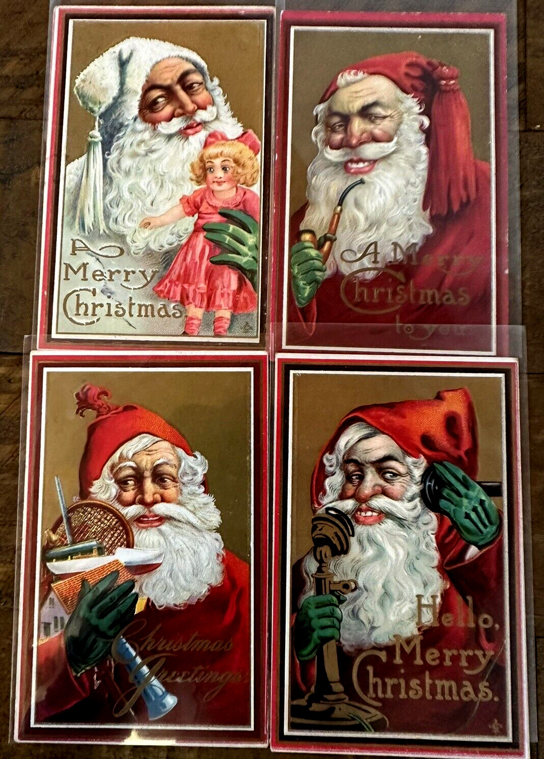 Lot of 4~SANTA CLAUS~with Toys~On Phone~Pipe~Doll~ Christmas Postcards Set~h990