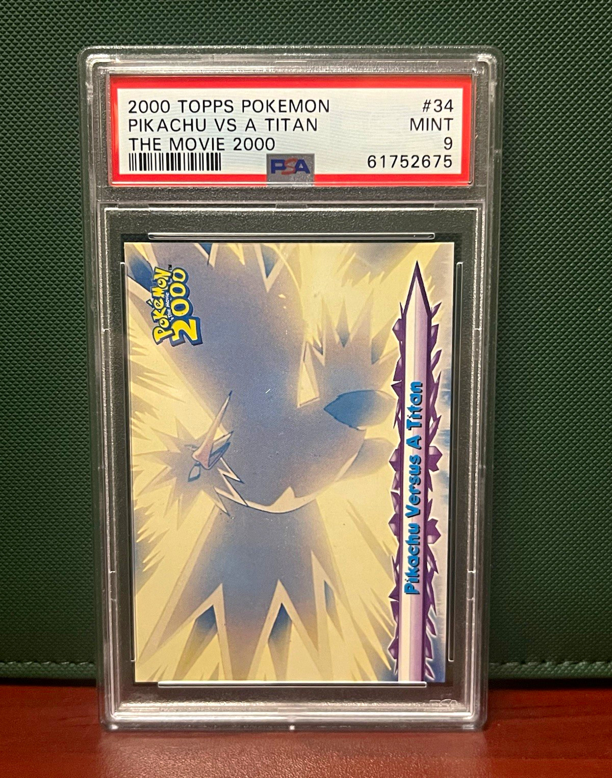 Topps Pokémon The Movie 2000 Pikachu Versus A Titan #34 - PSA 9 Mint - BASE Topps Pokémon The Movie 2000 Pikachu Versus A Titan #34 - PSA 9 Mint - BASE