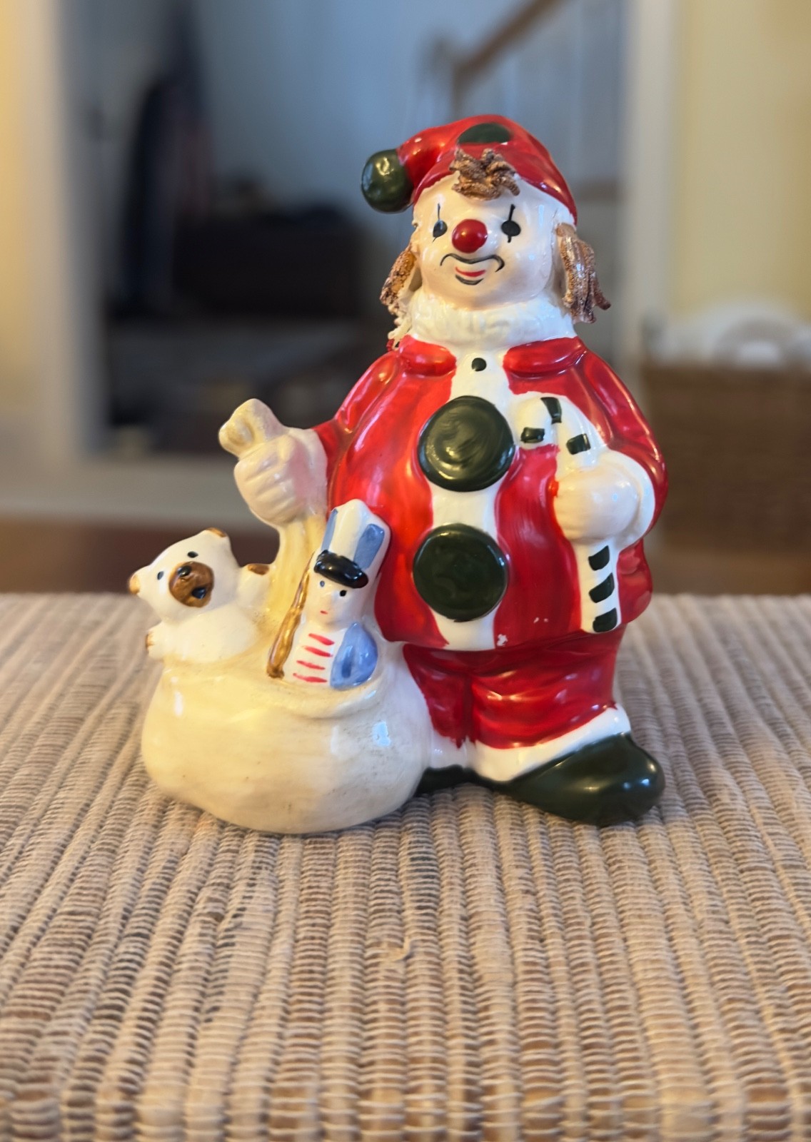 Vintage Christmas, Enesco ceramic clown. Festive Santa with bag of fun toys.