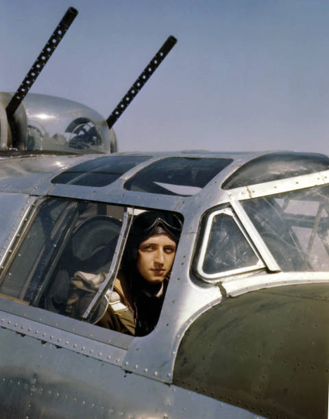 American co-pilot Lieutenant William C Rowland sits cockpit Consol- Old Photo