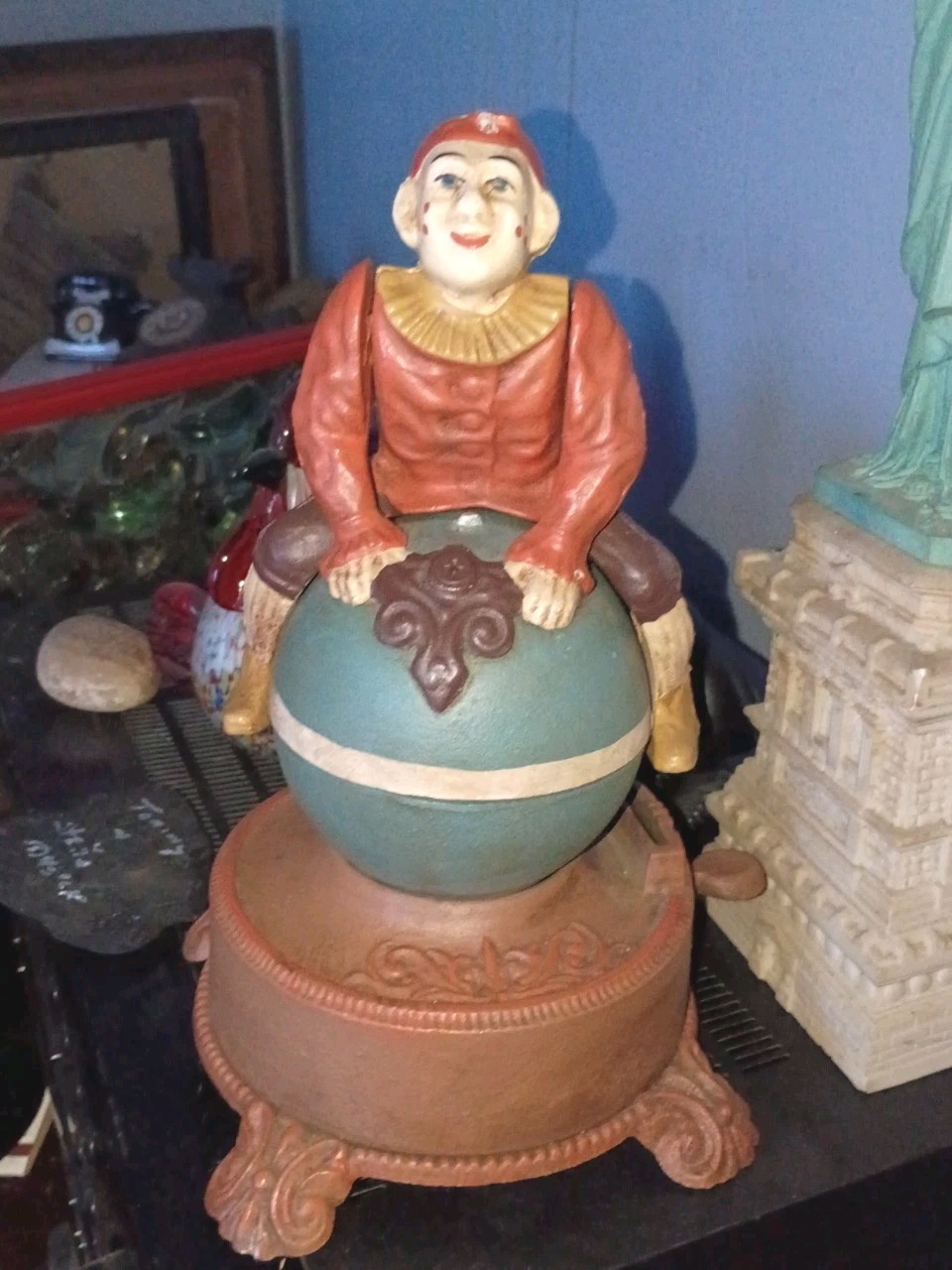 J & E Stevens Clown on Globe Cast Iron Mechanical Coin Bank Spinning Acrobat