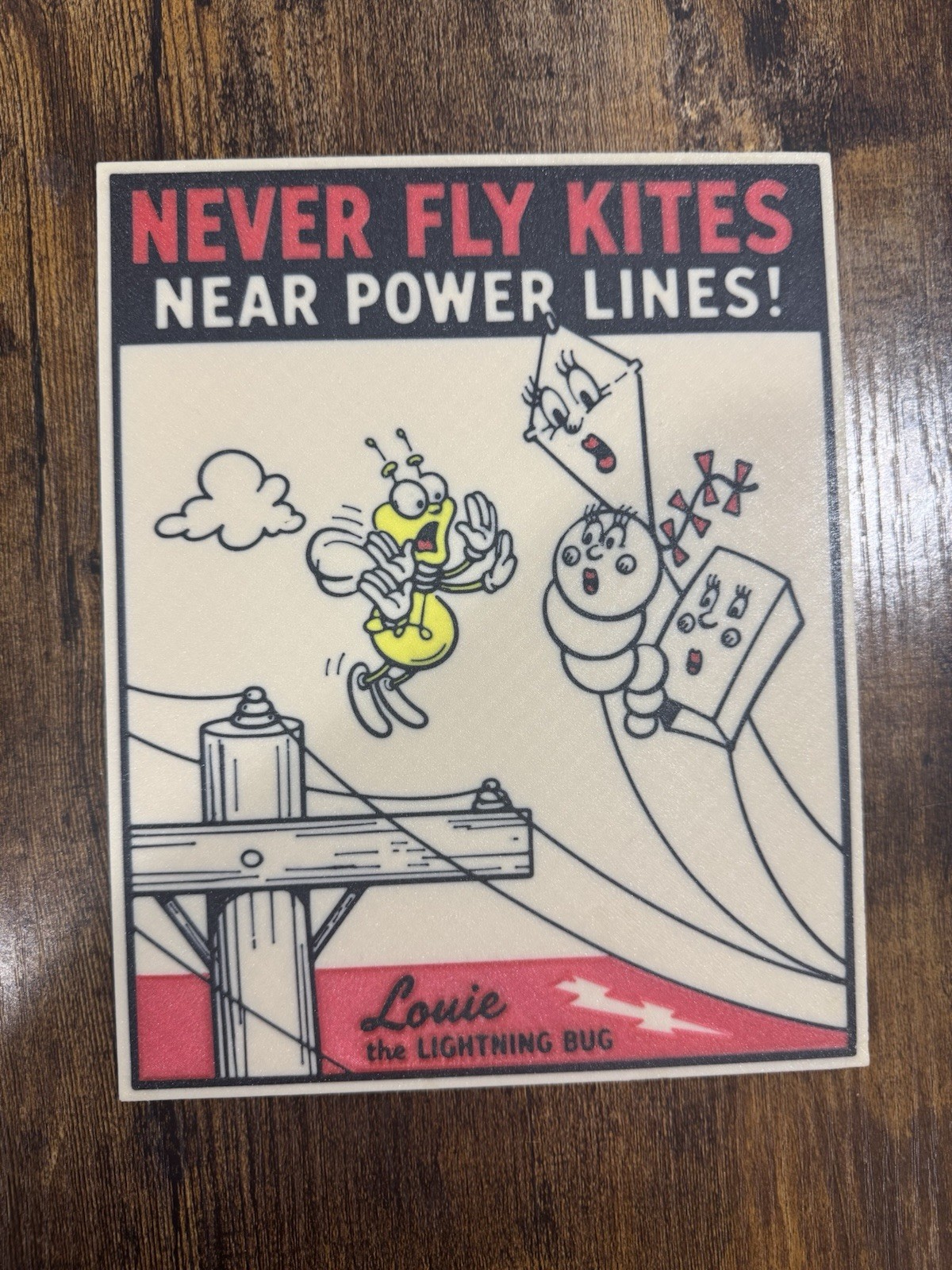 Replica Vintage Louie Lightning Bug Sign “Never Fly Kites Near Power Lines” 9.5”