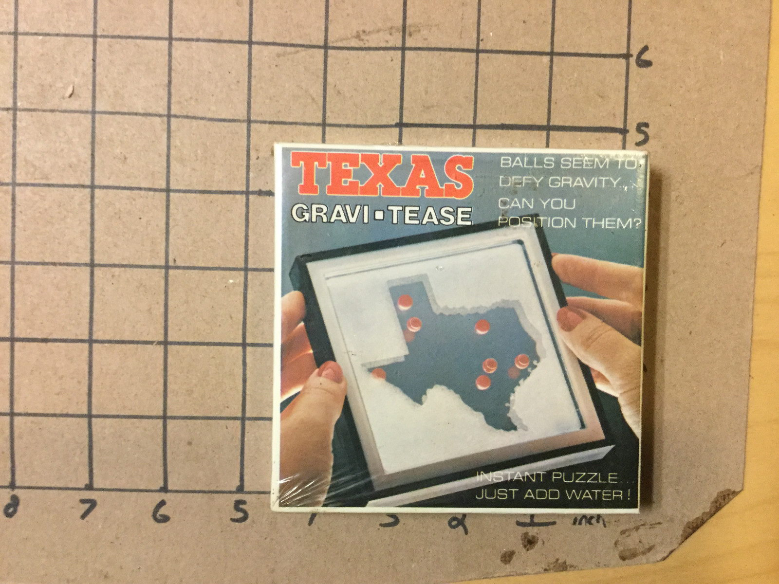 Original Vintage Puzzle: TEXAS GRAVI-TEASE -- SEALED just add water -- 1980