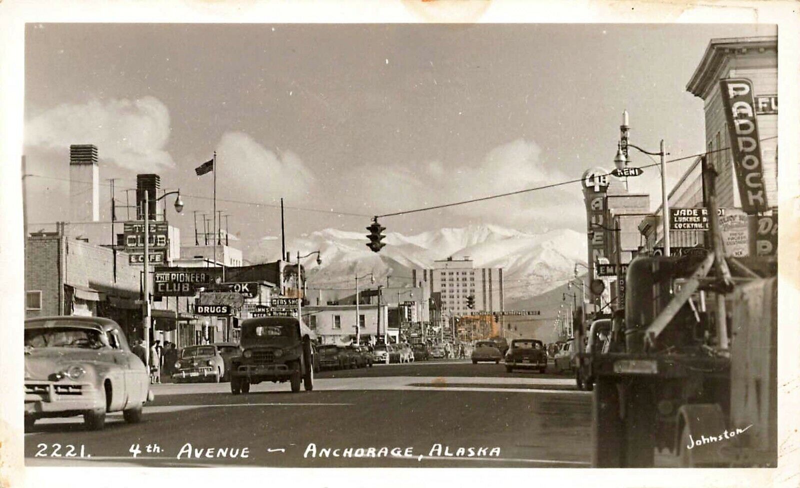 Anchorage AK 4TH Avenue Storefronts Old Cars Truck  RPPC  By Johnston