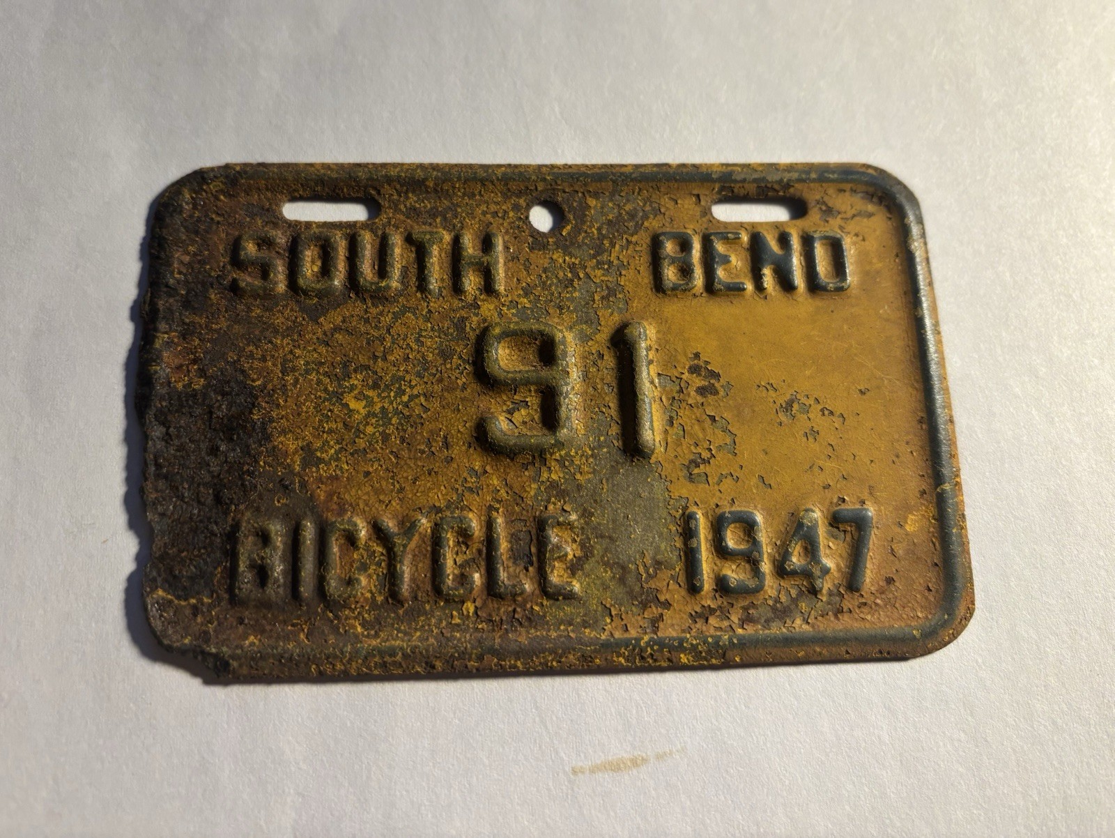 1947 South Bend Indiana, bicycle, small bike license plate, # 91 yellow 1947 South Bend Indiana, bicycle, small bike license plate, # 91 yellow