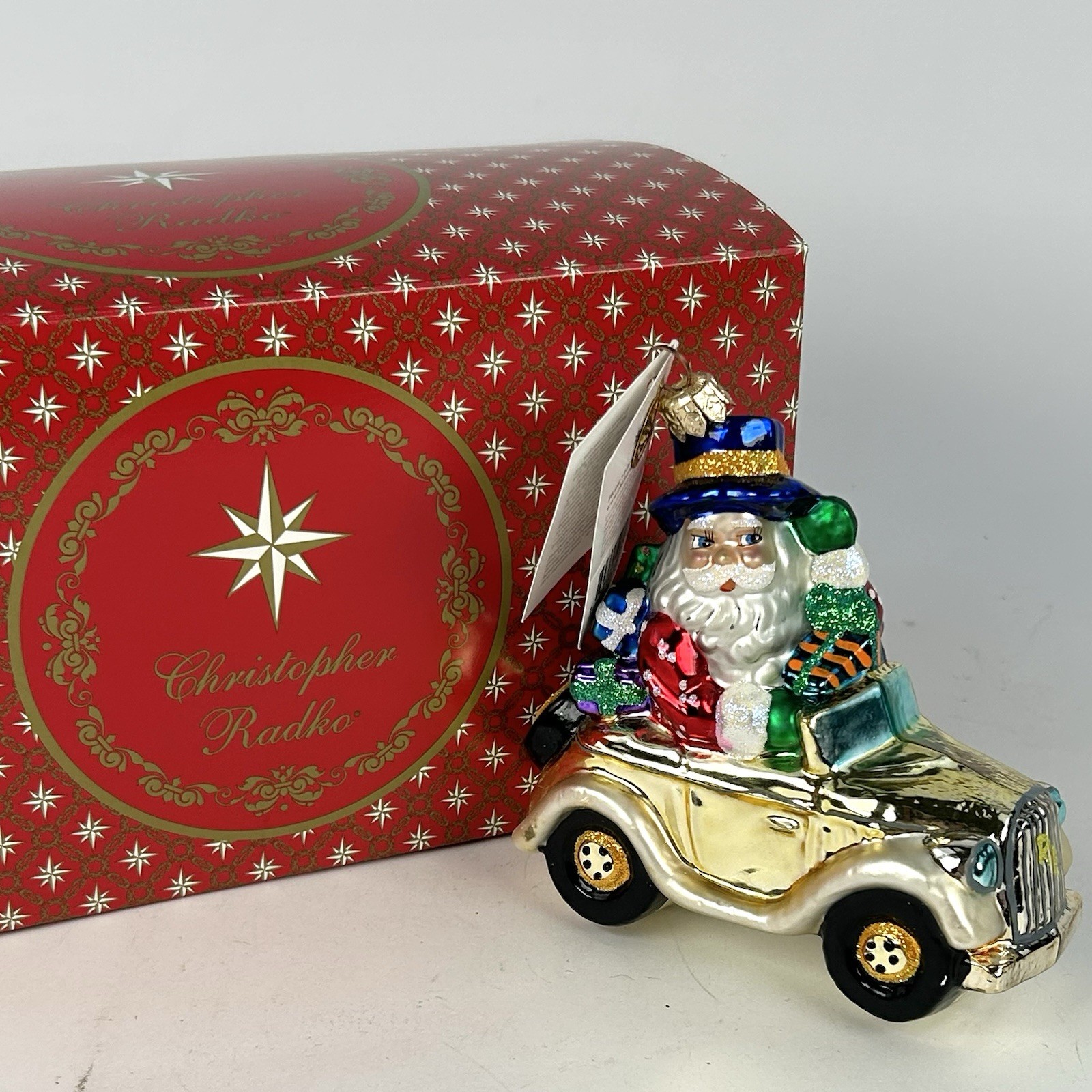Radko Car HOLIDAY ROLLS Ornament 00-185-0 Santa Royce QVC 4.5 x 5” Box & Tag