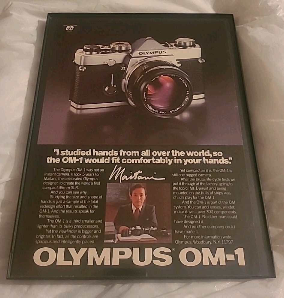 Olympus OM-1 Camera Maitani Vintage 1980 Print Ad Framed 8.5x11