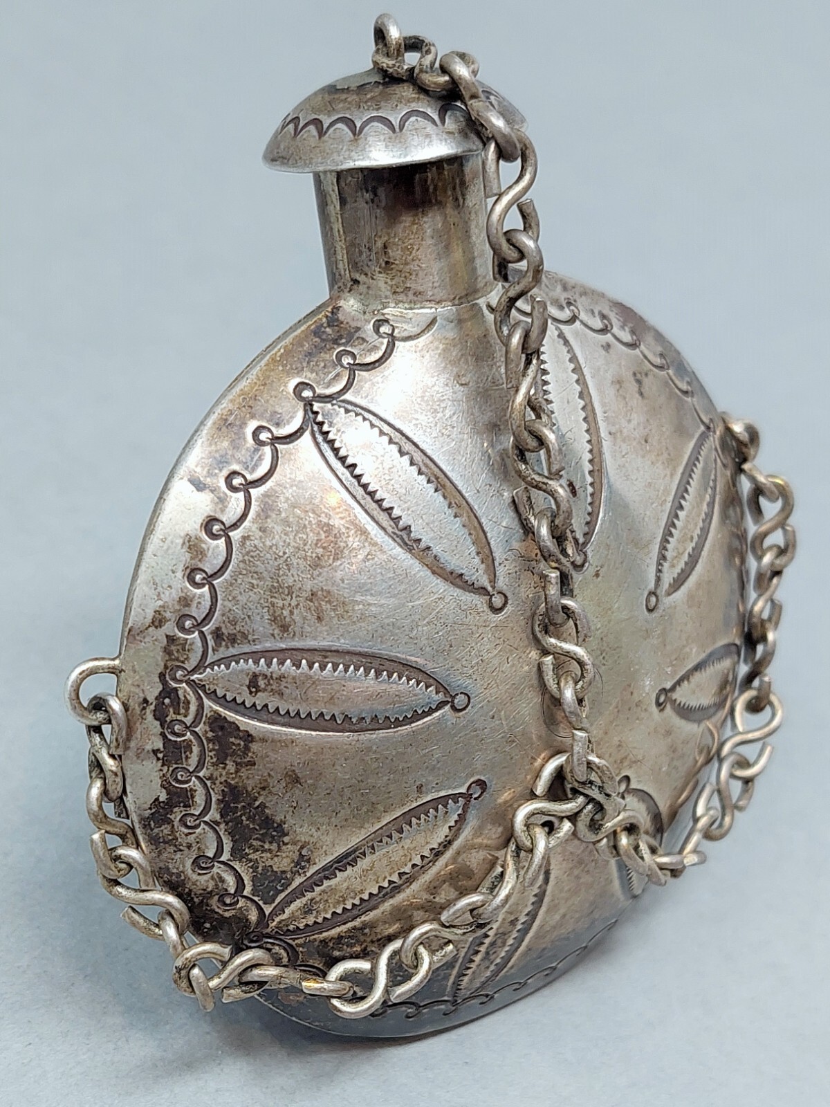 Early 20th Century Navajo Silver Tobacco Canteen. Early 20th Century Navajo Silver Tobacco Canteen.