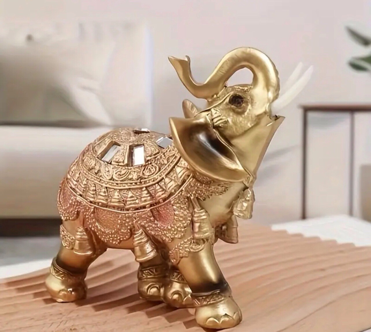 Ornate Golden Elephant Statue with Raised Trunk