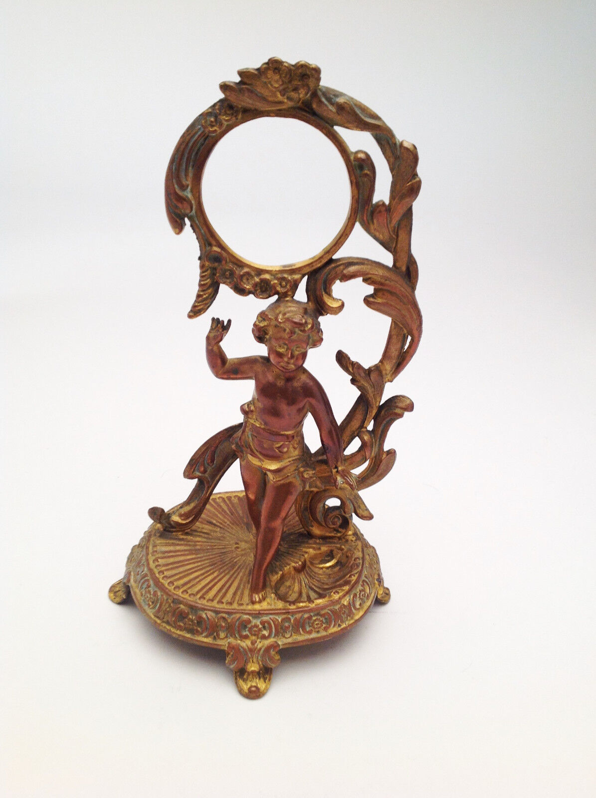 FRENCH STYLE GILT METAL FIGURAL FRAME. HEIGHT 10 1/2\