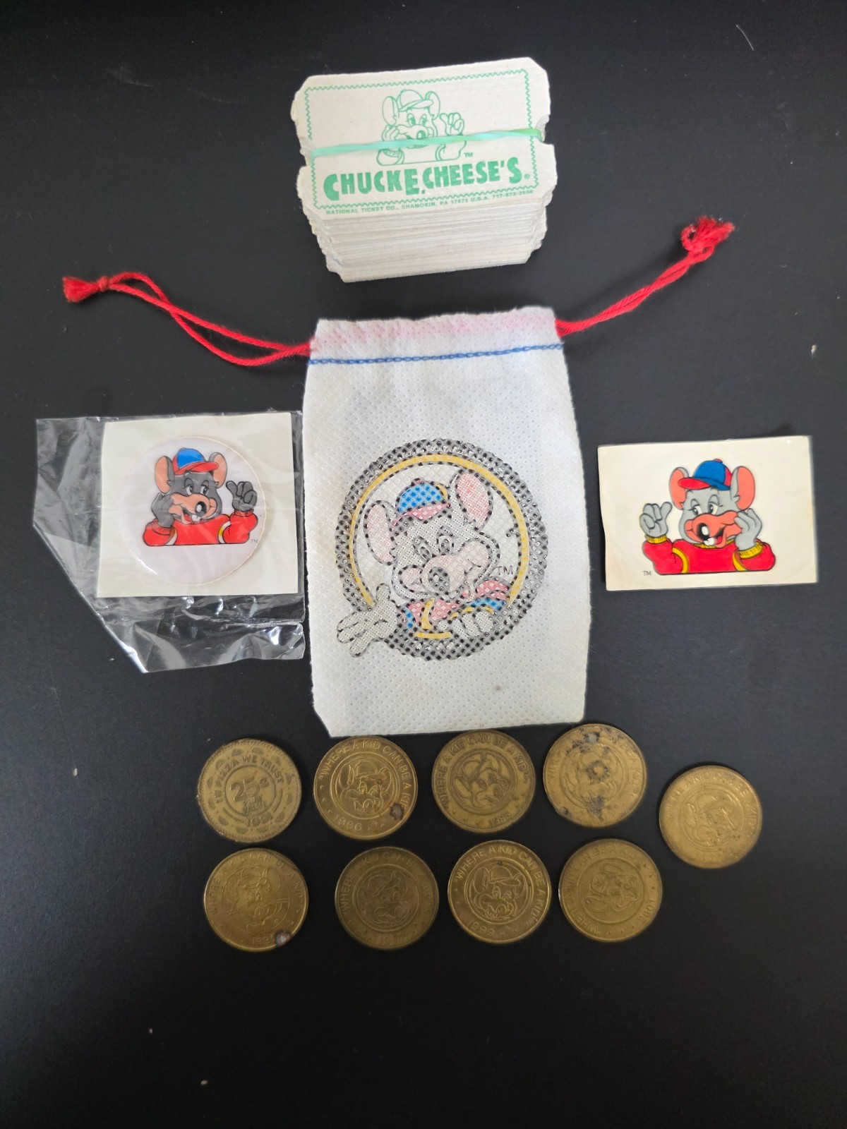 Vintage Chuck E. Cheese Lot Tokens Pin Sticker Drawstring Bag Tickets Arcade